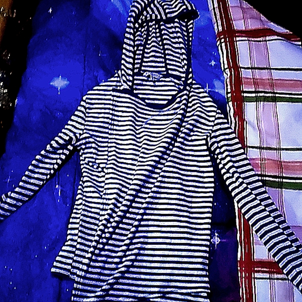 A stirred sweater size 10/12